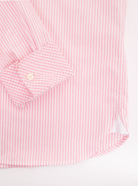 Flat lay of men's long sleeved shirt with pale pink thin stripe and gingham cuff and collar pattern on the inside. Made with 100% cotton in Thomas Mason fabric.